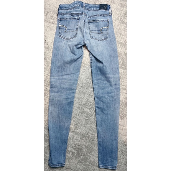 AEO • DISTRESSED SKINNY JEANS - Picture 2 of 8